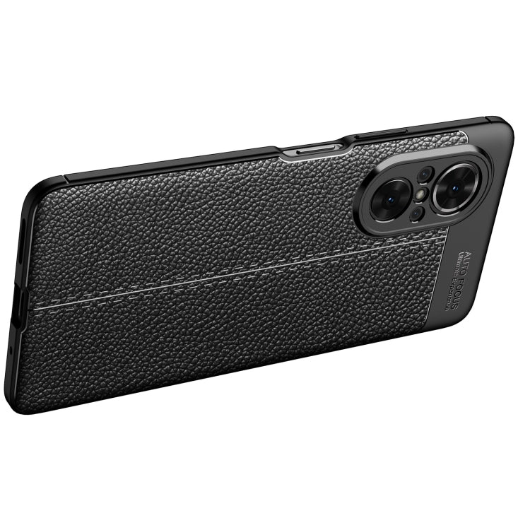 Black litchi-texture TPU phone case back with dual camera cutout and slim reinforced sides