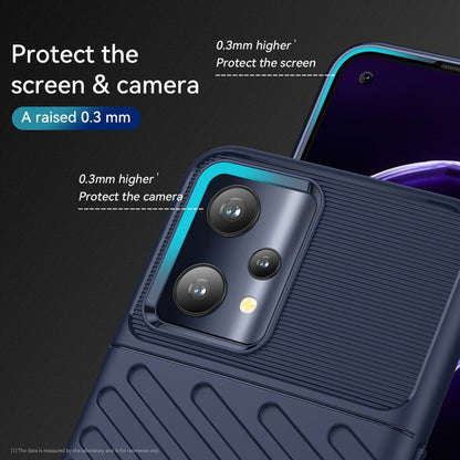 Blue TPU phone case with camera protection bezel and raised screen edge