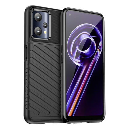 Black shockproof TPU phone case with textured grip and camera cutout for OPPO Realme