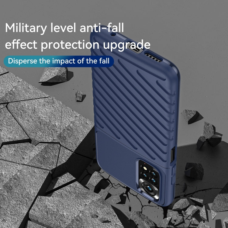 Blue TPU shockproof phone case with impact-dispersing ridges at back