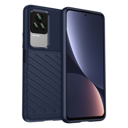 Blue shockproof TPU phone case with textured grip, camera cutout, and raised edges