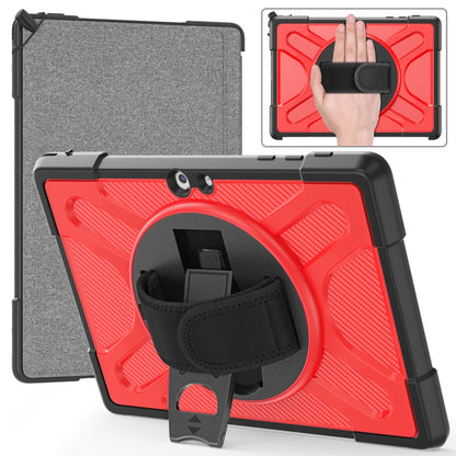 Red TPU tablet case with kickstand and hand strap, with gray fabric cover.