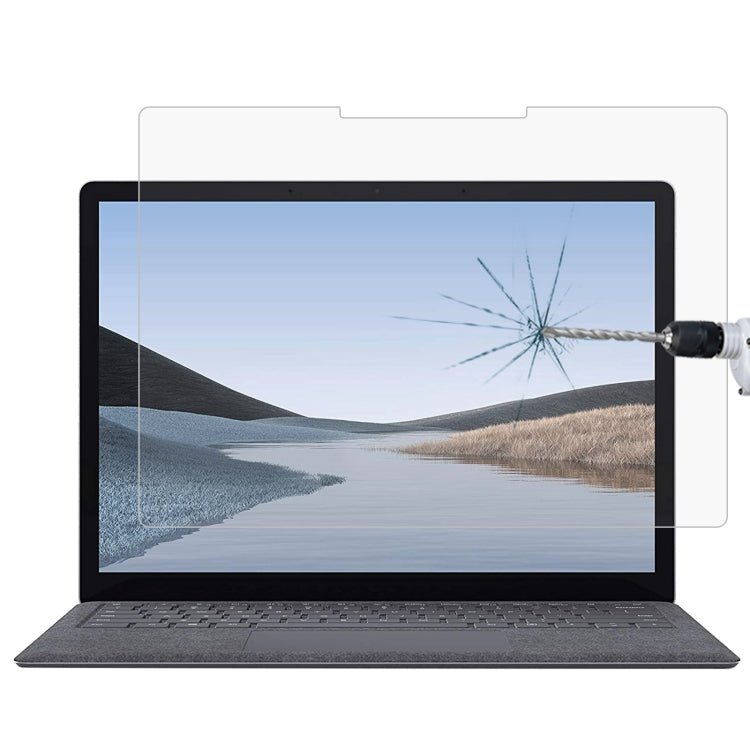 Clear tempered glass screen protector on touchscreen tablet or laptop display.