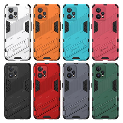 Multiple rugged phone cases in white, orange, blue, pink, black, red, gray, and green
