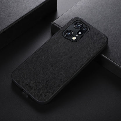 Black wood-texture PU phone case lying on its side, showing dual camera cutouts