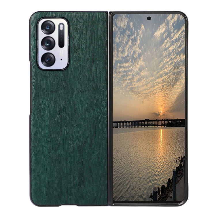 Green wood-texture PU phone case with camera cutouts; screen facing forward