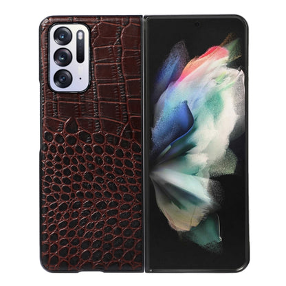 Coffee-brown crocodile-pattern leather phone case with phone front visible and camera area.
