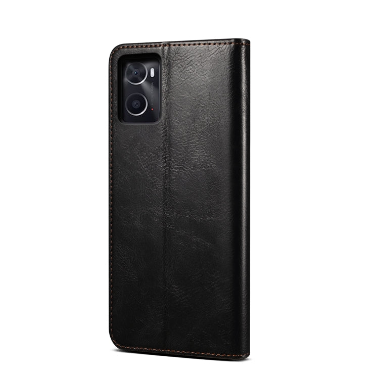 Black leather-look phone case with raised camera cutout and stitched border.
