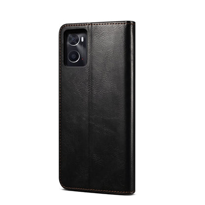 Black leather-look phone case with raised camera cutout and stitched border.