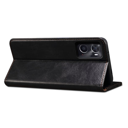 Black leather-look flip phone case with stand angle and stitched outer edge.