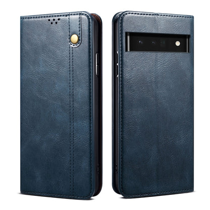 Blue leather wallet-style phone case with fold-over cover and camera window on back.