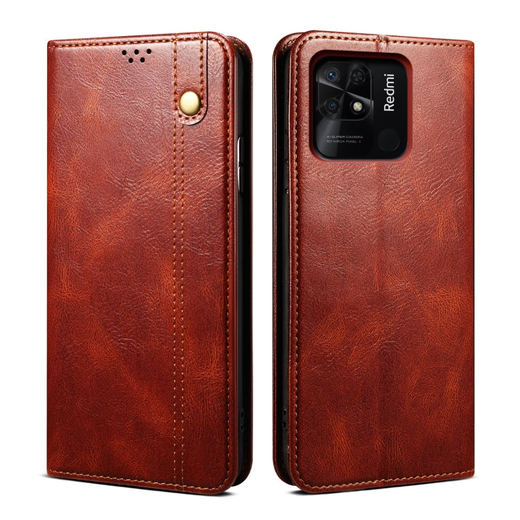 Brown oil-wax leather phone case with card slot and magnetic snap, textured finish