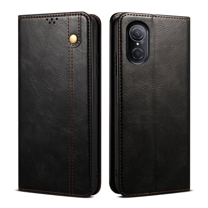 Black leather-look flip phone case front and back with gold snap and dual camera cutout.