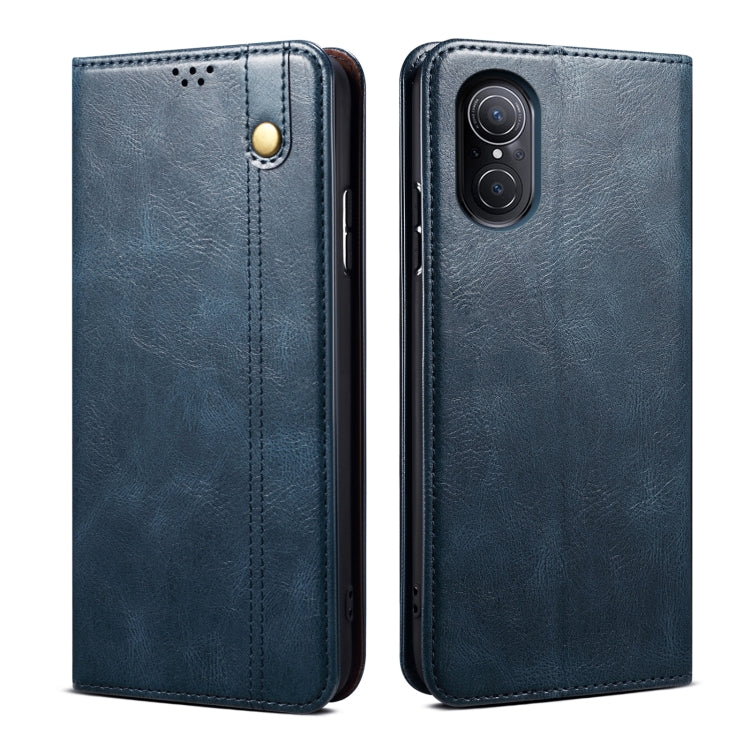 Blue oil-wax leather phone case with card slot and magnetic snap, textured finish