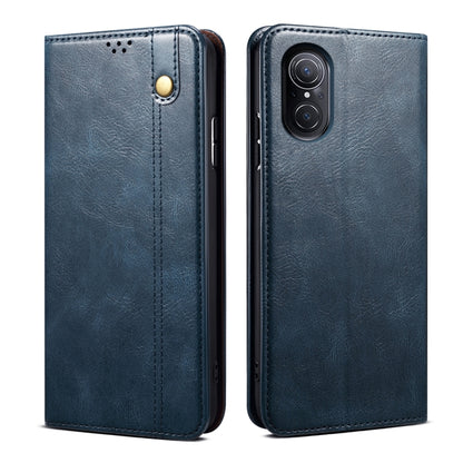 Blue oil-wax leather phone case with card slot and magnetic snap, textured finish