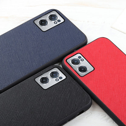 Leather phone cases in navy, black, and red with cross-texture and camera cutouts