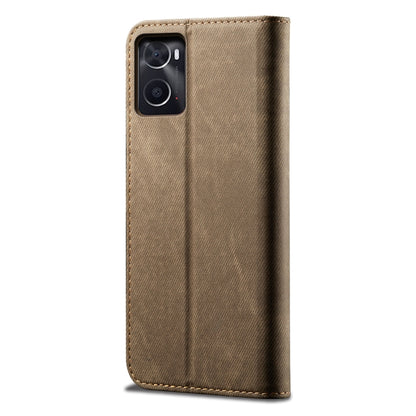 Khaki denim-textured leather phone case with stitched seam and camera cutouts