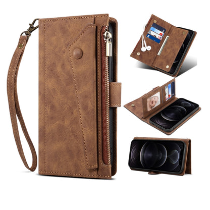 Brown leather flip phone case with wrist strap and card slot on inner flap.