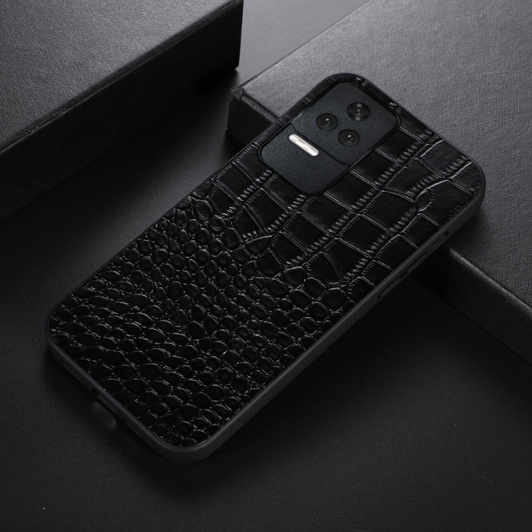 Black crocodile-pattern leather phone case with camera cutout, shown at an angle