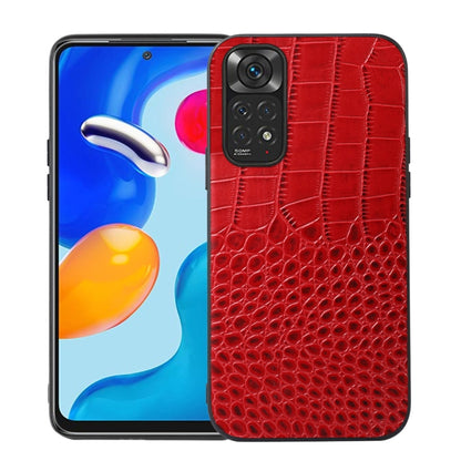 Red crocodile-pattern leather phone case with camera cutout, shown next to phone