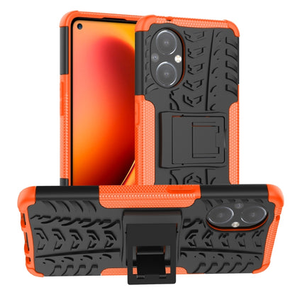 Orange and black shockproof phone case with tire texture and built-in holder