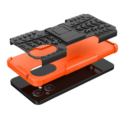 Orange and black shockproof phone case with kickstand holder and tire texture