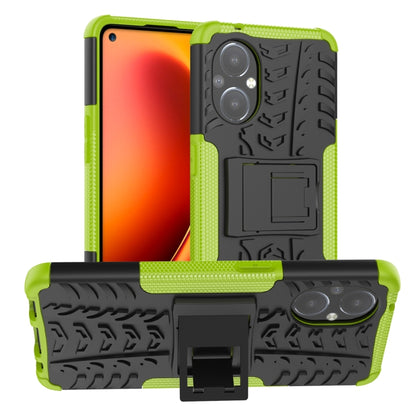 Green and black shockproof phone case with tire tread texture and built-in holder