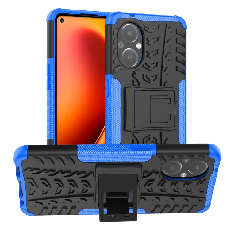 Shockproof phone case with tire-texture grip, blue bumper, built-in holder