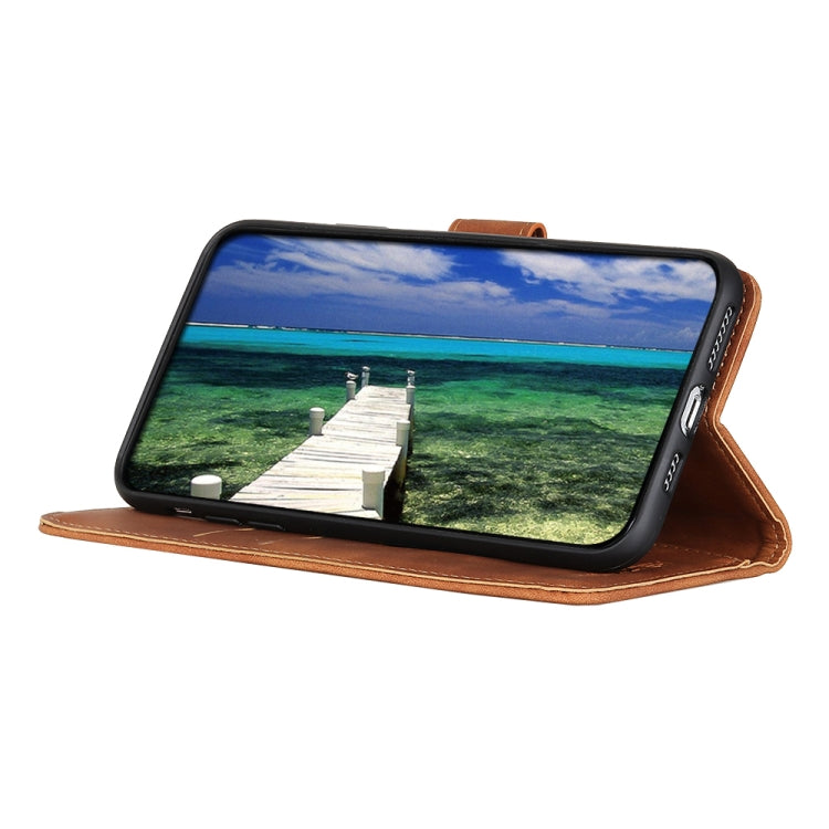 Brown leather flip phone case used as a horizontal stand