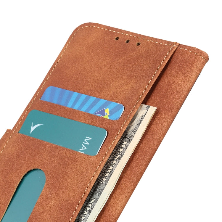 Close-up of brown leather card pocket inside a flip phone case