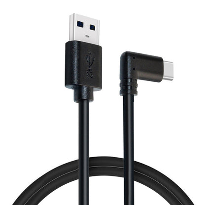 Coiled black USB-A male to USB-C elbow cable with two connectors