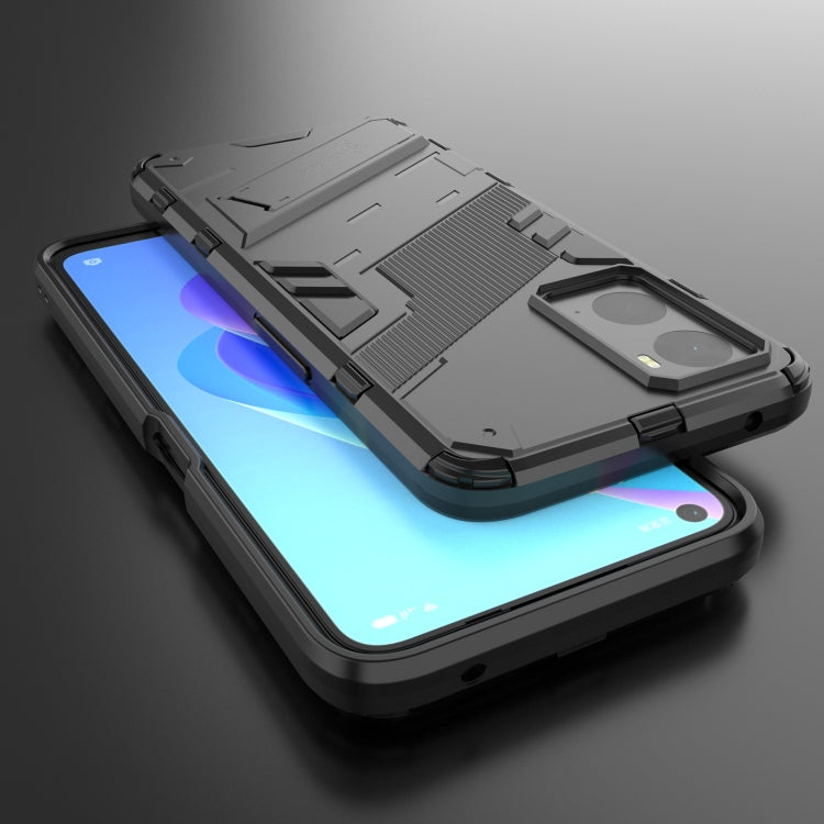 Dark gray rugged phone case with built-in holder stand and camera cutout