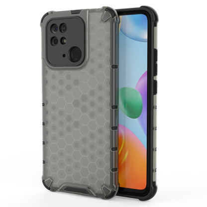 Shockproof phone case in dark gray with honeycomb pattern, raised corners and screen lip