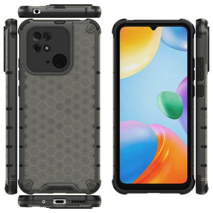 Shockproof phone case in black with honeycomb pattern, rear camera cutout and screen lip