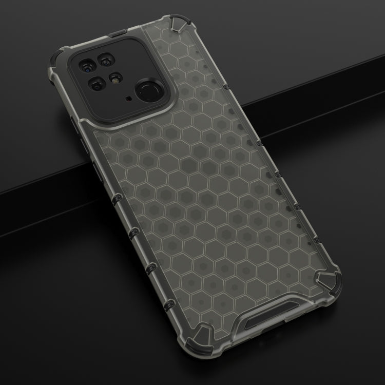 Shockproof phone case in light gray with honeycomb pattern and raised camera bezel