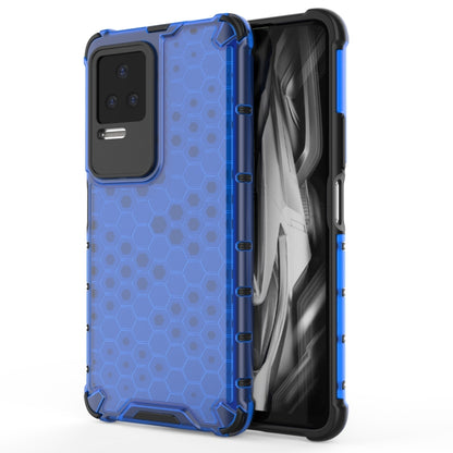 Shockproof phone case in blue with honeycomb pattern, side grip and camera cutout