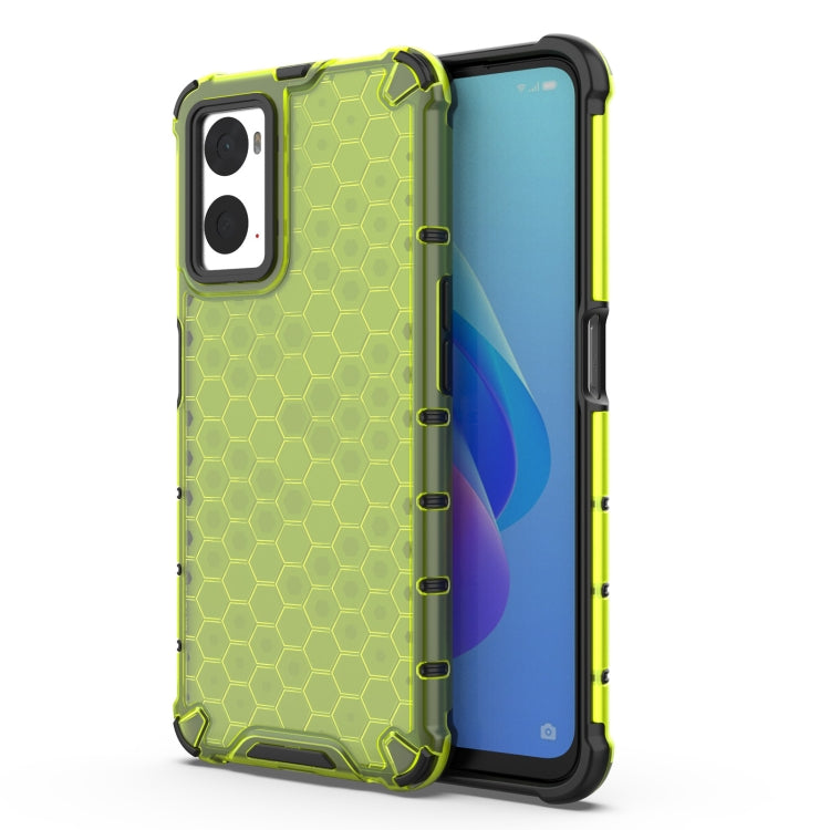Green protective phone case with honeycomb pattern, raised edges, and camera cutouts