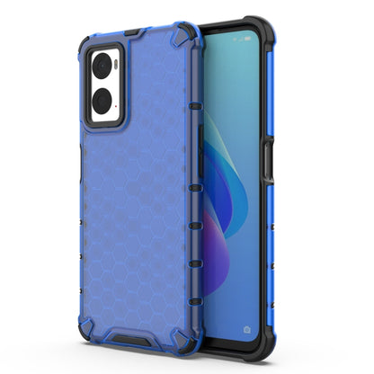 Blue protective phone case with honeycomb pattern, raised edges, and camera cutouts