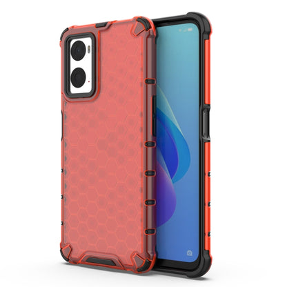 Red protective phone case with honeycomb pattern, raised edges, and camera cutouts