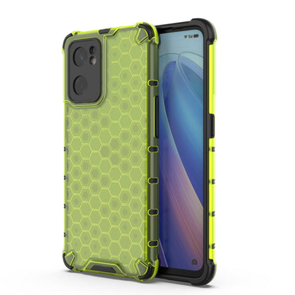 Green protective phone case with honeycomb texture, thick corners, and camera cutouts