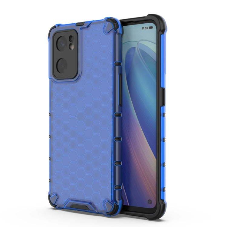 Blue protective phone case with honeycomb texture, thick corners, and camera cutouts