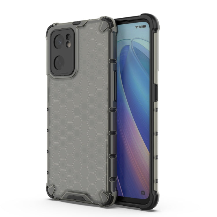 Gray protective phone case with honeycomb texture, thick corners, and camera cutouts