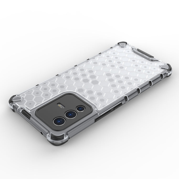 Shockproof honeycomb phone case with hex pattern; transparent edges and button covers