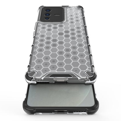 Shockproof honeycomb phone case with clear frame and dark base; camera and speaker openings