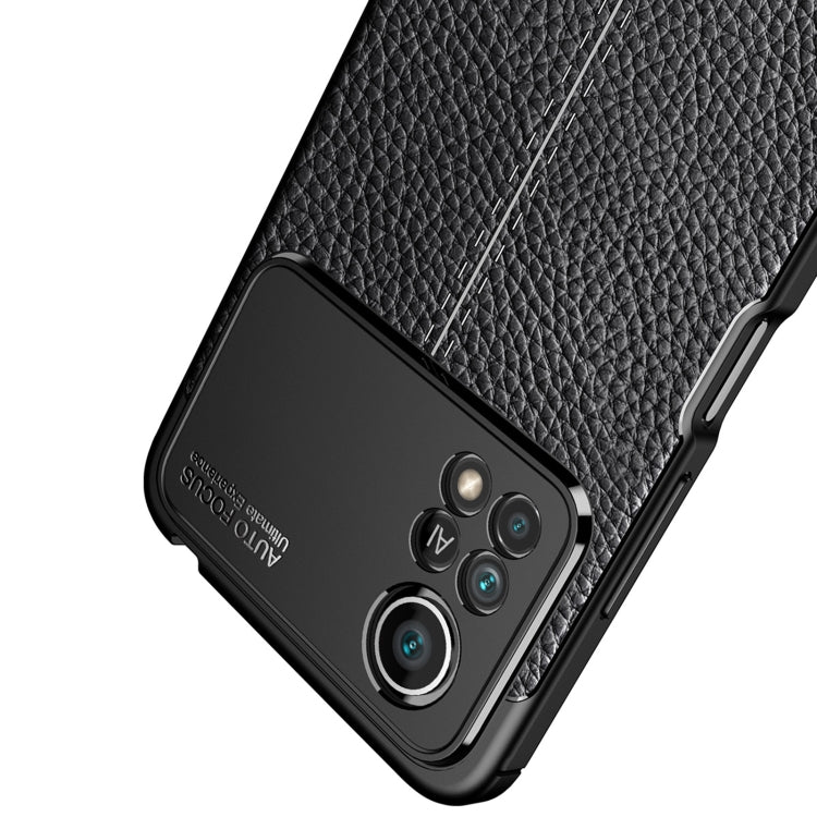 Black litchi-texture TPU phone case with triple-camera cutout and textured grip