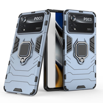 Shockproof protective phone case with magnetic ring holder, light blue back with phone installed