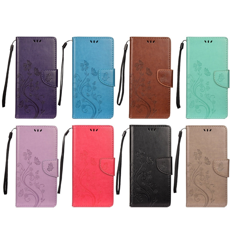 Assorted colors leather phone wallet cases with butterfly floral pattern, wrist straps.