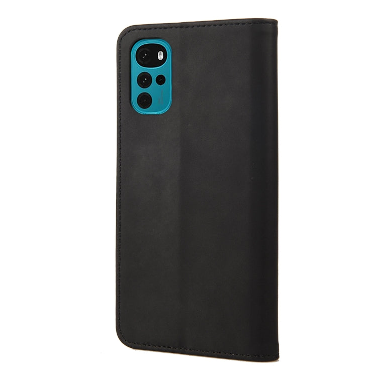 Black leather phone case back view with cutout for camera and side buttons