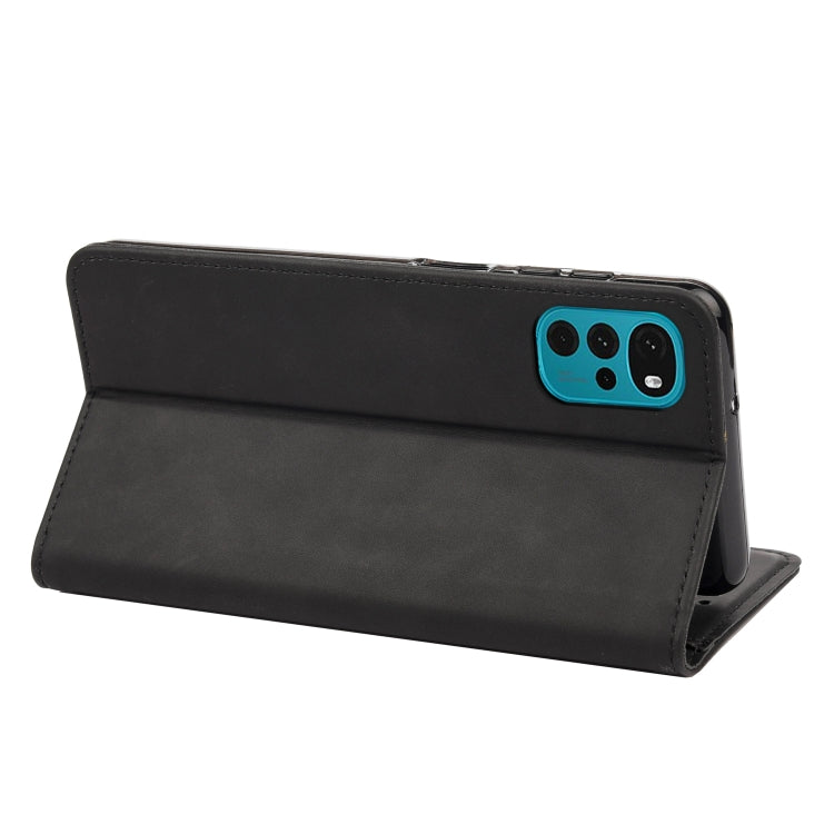 Black leather phone wallet case with flip stand, camera cutout visible