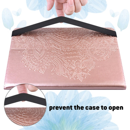 Rose gold folio tablet case with peacock embossed design and wrap strap closure